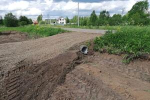 Выравнивание земельного участка, укладка дренажной трубы,устройство заезда. — Бобров Денис Владимирович